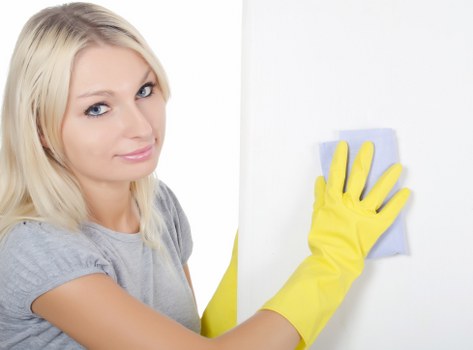 Professional home cleaning in a Putney kitchen and living area